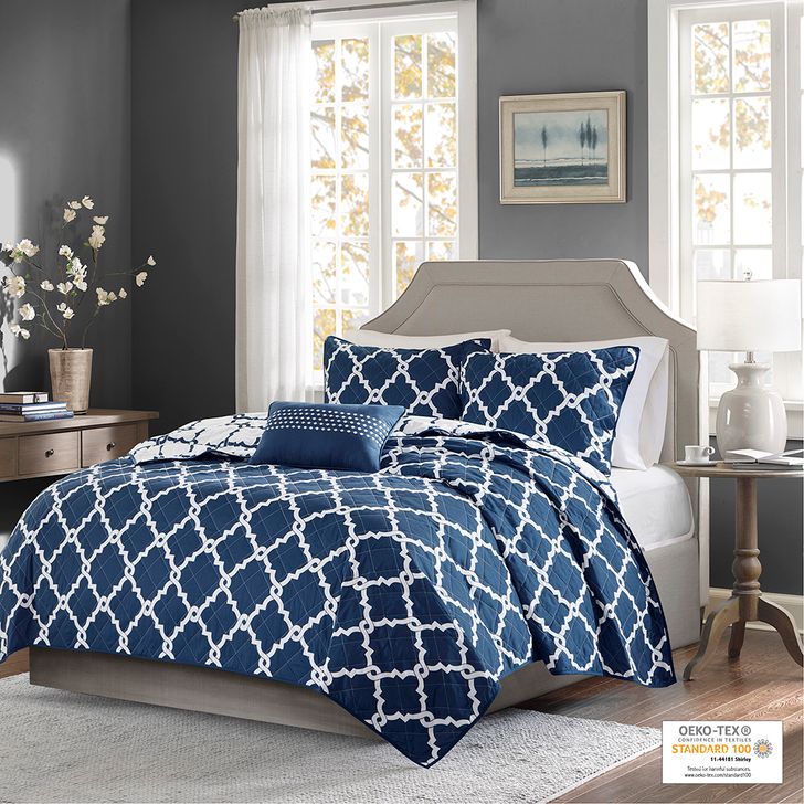 The appearance of Polyester Microfiber Printed Queen Coverlet Set With Quilting In Navy designed by Olliix in the transitional interior design. This navy piece of furniture  was selected by 1StopBedrooms from Merritt Collection to add a touch of cosiness and style into your home. Sku: MPE13-240. Material: Polyester. Bed Size: Queen. Product Type: Coverlet Set. Image1