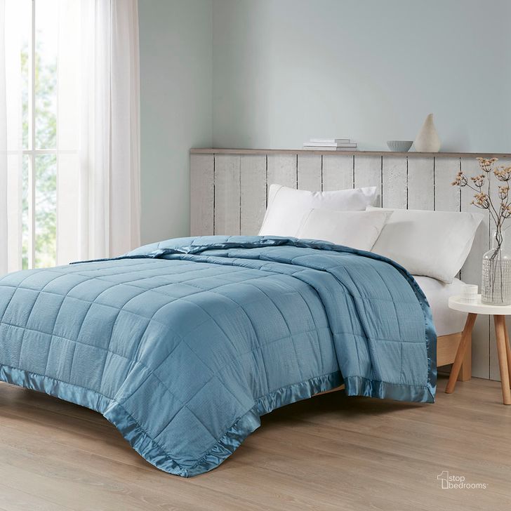The appearance of Polyester Premium Oversized Down Alternative Twin Blanket In Slate Blue designed by Olliix in the transitional interior design. This slate blue piece of furniture  was selected by 1StopBedrooms from Cambria Collection to add a touch of cosiness and style into your home. Sku: MP51-7646. Material: Polyester. Bed Size: Twin. Product Type: Throw. Image1