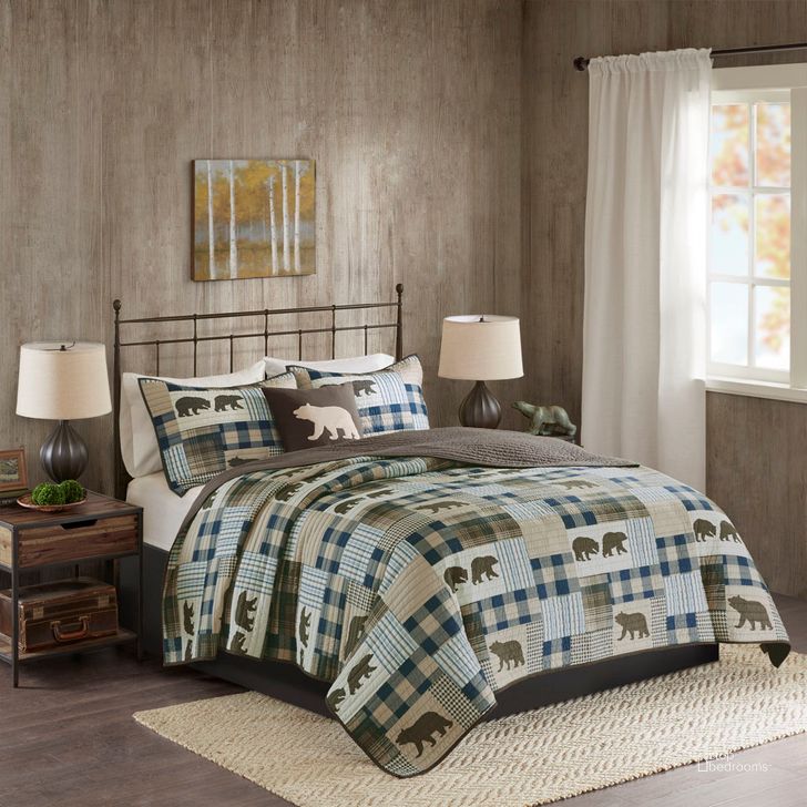 The appearance of Polyester Printed Oversized Queen Quilt Set In Brown/Blue designed by Olliix in the cabin / lodge interior design. This brown/blue piece of furniture  was selected by 1StopBedrooms from Twin Falls Collection to add a touch of cosiness and style into your home. Sku: WR14-2233. Material: Polyester. Bed Size: Queen. Product Type: Quilt Set. Image1