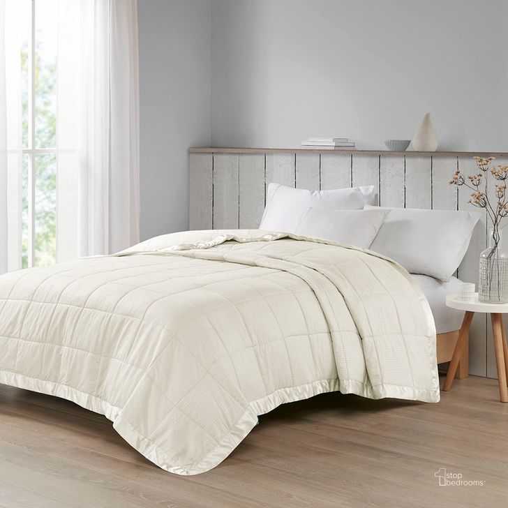 The appearance of Polyester Solid Embossed Microfiber Premium Oversized Queen Blanket In Ivory designed by Olliix in the transitional interior design. This ivory piece of furniture  was selected by 1StopBedrooms from Cambria Collection to add a touch of cosiness and style into your home. Sku: MP51-2599. Material: Polyester. Bed Size: Queen. Product Type: Throw. Image1