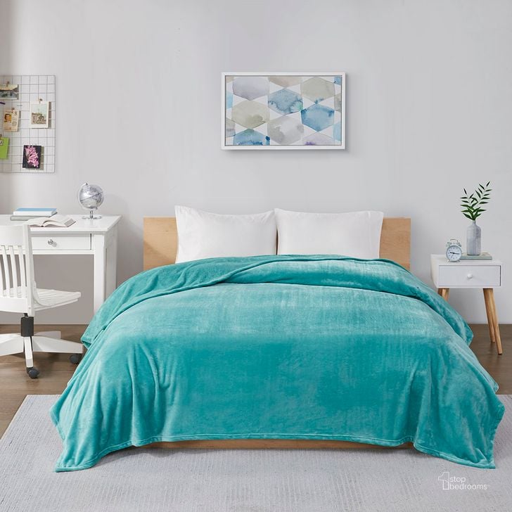 The appearance of Polyester Solid Microlight Plush Brushed Oversized King Blanket In Aqua designed by Olliix in the transitional interior design. This aqua piece of furniture  was selected by 1StopBedrooms from Microlight Plush Collection to add a touch of cosiness and style into your home. Sku: ID51-823. Material: Polyester. Bed Size: King. Product Type: Throw. Image1