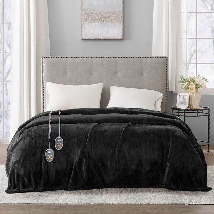 The appearance of Polyester Solid Microlight Reversible Heated Twin Blanket In Black designed by Olliix in the transitional interior design. This black piece of furniture  was selected by 1StopBedrooms from Heated Plush Collection to add a touch of cosiness and style into your home. Sku: BR54-0907. Material: Polyester. Bed Size: Twin. Product Type: Throw. Image1