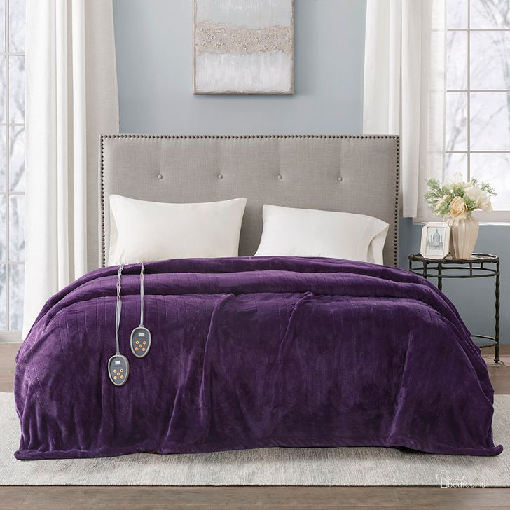 The appearance of Polyester Solid Microlight Reversible Heated Twin Blanket In Purple designed by Olliix in the transitional interior design. This purple piece of furniture  was selected by 1StopBedrooms from Heated Plush Collection to add a touch of cosiness and style into your home. Sku: BR54-1932. Material: Polyester. Bed Size: Twin. Product Type: Throw. Image1