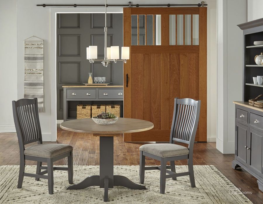 The appearance of Port Townsend Grey And Seaside Pine 42" Extendable Dining Room Set designed by A-America in the transitional interior design. This gray piece of furniture  was selected by 1StopBedrooms from Port Townsend Collection to add a touch of cosiness and style into your home. Sku: POTSP610B;POTSP610T;POTSP2452. Table Base Style: Pedestal. Table Top Shape: Round. Product Type: Dining Room Set. Material: Pine. Image1