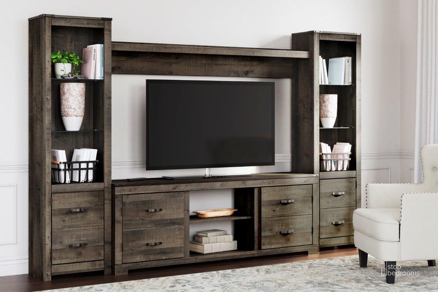 The appearance of Rainville Brown Entertainment Center and Wall 0qd24533003c designed by Bennett Interiors in the transitional interior design. This brown piece of furniture  was selected by 1StopBedrooms from Rainville Collection to add a touch of cosiness and style into your home. Sku: W446-168;W446-127;W446-124;W446-124. Material: Wood. Product Type: Entertainment Center. Image1