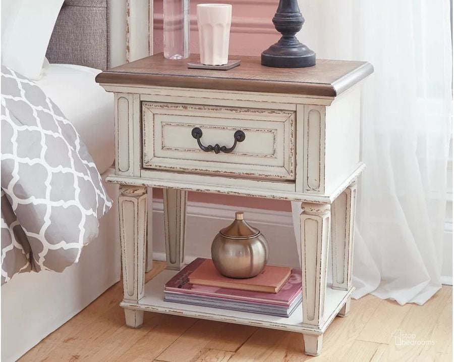 The appearance of Realyn Two Tone 1 Drawer Nightstand designed by Signature Design by Ashley in the rustic / southwestern interior design. This chipped white piece of furniture  was selected by 1StopBedrooms from Realyn Collection to add a touch of cosiness and style into your home. Sku: B743-91. Material: Wood. Product Type: Nightstand. Image1