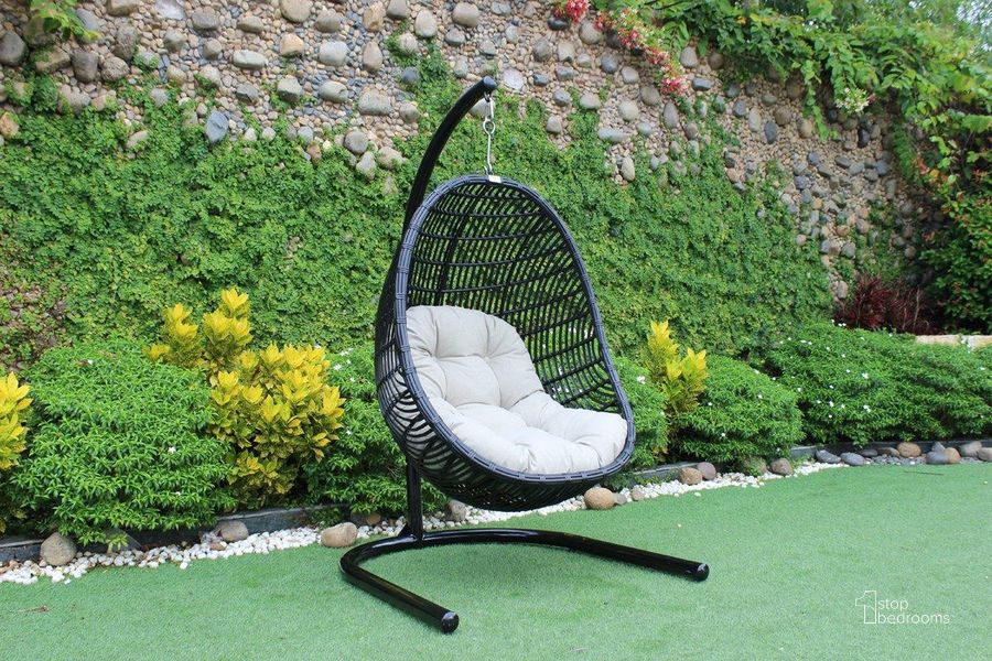 The appearance of Renava Havana Outdoor Black And Beige Hanging Chair designed by VIG Furniture in the modern / contemporary interior design. This beige piece of furniture  was selected by 1StopBedrooms from Renava Collection to add a touch of cosiness and style into your home. Sku: VGATRAHM-002A. Material: Rattan. Product Type: Outdoor Chair. Image1