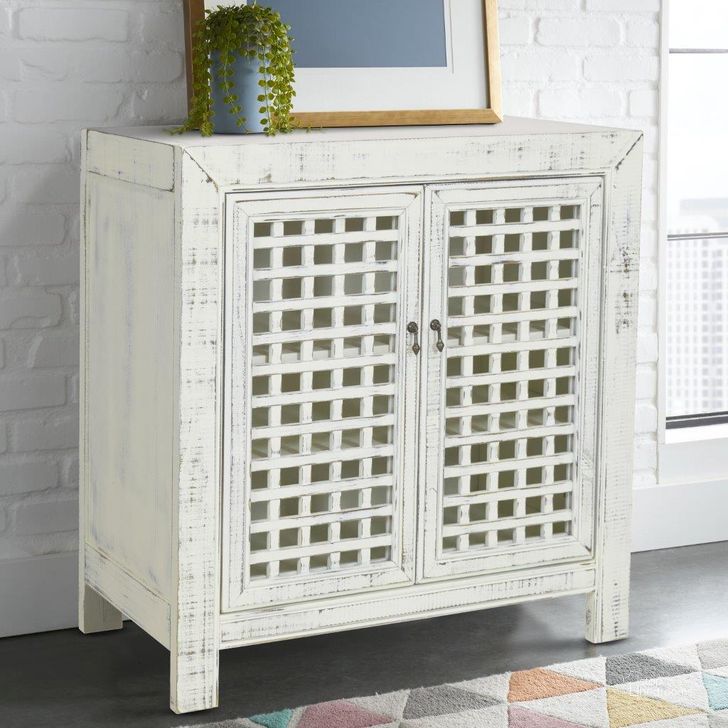 The appearance of Rio Accent Cabinet In White designed by Steve Silver in the transitional interior design. This antiqued white piece of furniture  was selected by 1StopBedrooms from Rio Collection to add a touch of cosiness and style into your home. Sku: RI250ACW. Product Type: Accent Table. Material: MDF. Image1