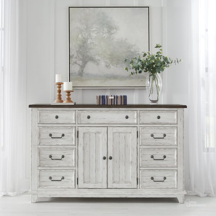 The appearance of River Place 2 Door 9 Drawer Dresser In Riverstone White and Tobacco designed by Liberty in the country / farmhouse interior design. This white piece of furniture  was selected by 1StopBedrooms from River Place Collection to add a touch of cosiness and style into your home. Sku: 237-BR31. Product Type: Dresser. Material: Wood Veneer.