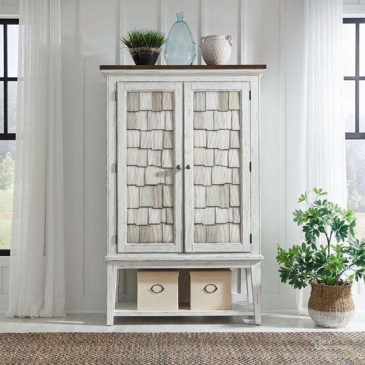 The appearance of River Place Bar Cabinet In Riverstone White and Tobacco designed by Liberty in the country / farmhouse interior design. This white piece of furniture  was selected by 1StopBedrooms from River Place Collection to add a touch of cosiness and style into your home. Sku: 237-AC5078. Product Type: Bar Cabinet. Material: Wood Veneer. Image1