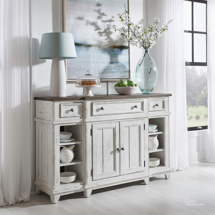 The appearance of River Place Breakfront Server In Riverstone White and Tobacco designed by Liberty in the country / farmhouse interior design. This white piece of furniture  was selected by 1StopBedrooms from River Place Collection to add a touch of cosiness and style into your home. Sku: 237-SR6642. Product Type: Server. Material: Wood Veneer. Image1