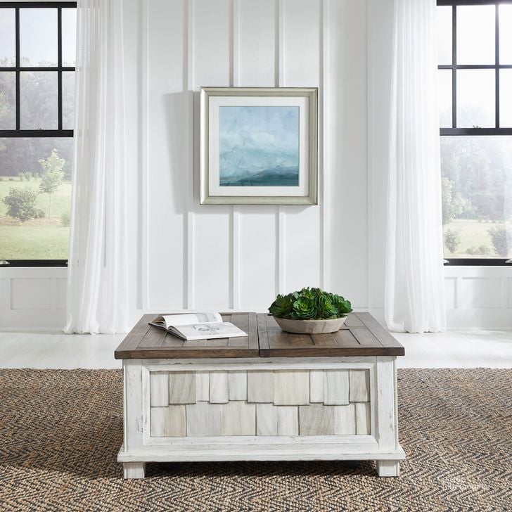 The appearance of River Place Lift Top Storage Cocktail Table In Riverstone White and Tobacco designed by Liberty in the country / farmhouse interior design. This white piece of furniture  was selected by 1StopBedrooms from River Place Collection to add a touch of cosiness and style into your home. Sku: 237-OT1011. Product Type: Cocktail Table. Material: Wood Veneer. Image1