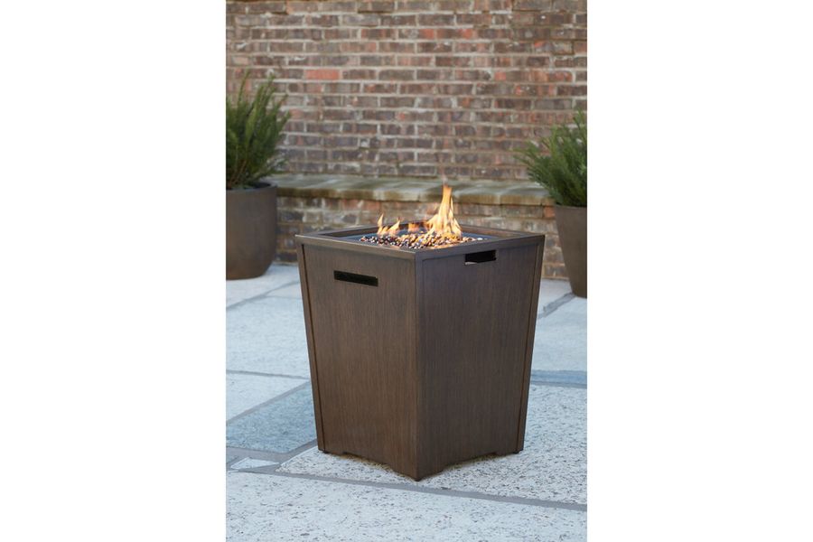 The appearance of Rodeway South Brown Fire Pit designed by Signature Design by Ashley in the transitional interior design. This brown piece of furniture  was selected by 1StopBedrooms from Rodeway South Collection to add a touch of cosiness and style into your home. Sku: P040-773. Material: Metal. Product Type: Outdoor Table. Image1