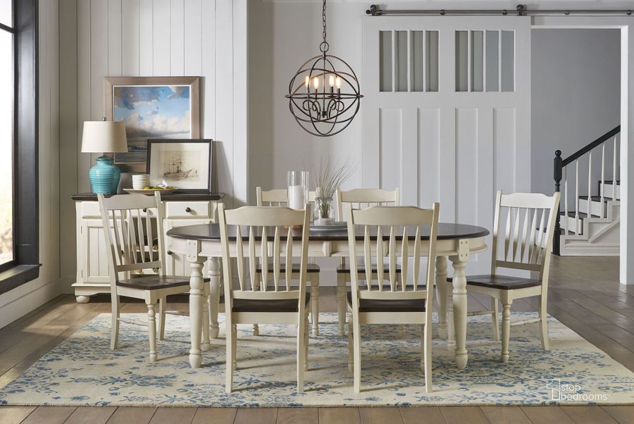 The appearance of Roselton White Dining Room Set 0qb2350177 designed by Isaac Tahari in the transitional interior design. This white piece of furniture  was selected by 1StopBedrooms from Roselton Collection to add a touch of cosiness and style into your home. Sku: BRICO6310;BRICO2852. Table Base Style: Legs. Table Top Shape: Oval. Product Type: Dining Room Set. Material: Rubberwood. Size: 76". Image1