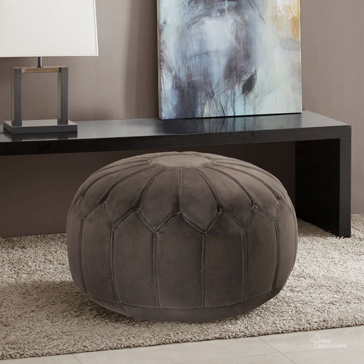 The appearance of Round Pouf Ottoman In Brown designed by Olliix in the modern / contemporary interior design. This brown piece of furniture  was selected by 1StopBedrooms from Kelsey Collection to add a touch of cosiness and style into your home. Sku: FPF18-0169. Material: Polyester. Product Type: Ottoman. Image1