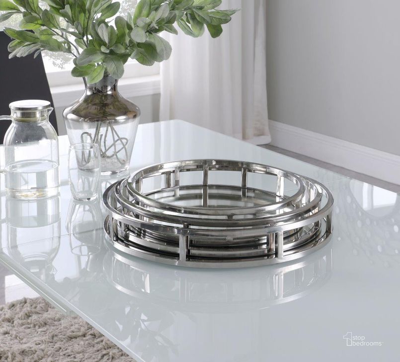 The appearance of Round Stainless Steel Mirrored Nesting Trays designed by Chintaly Imports in the modern / contemporary interior design. This polished piece of furniture  was selected by 1StopBedrooms from  to add a touch of cosiness and style into your home. Sku: 1008-RND-TR. Product Type: Tray. Material: Stainless Steel. Image1