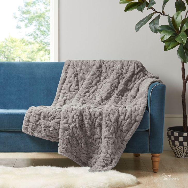 The appearance of Ruched Fur Polyester Solid Brushed Long Fur Knitted Throw In Grey designed by Olliix in the transitional interior design. This grey piece of furniture  was selected by 1StopBedrooms from Ruched Fur Collection to add a touch of cosiness and style into your home. Sku: MP50-3090. Material: Polyester. Product Type: Throw. Image1