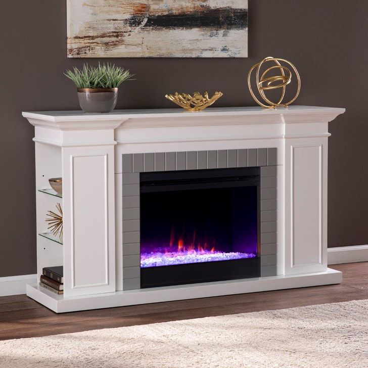 The appearance of Rylana Bookcase Color Changing Fireplace designed by SEI Furniture in the transitional interior design. This white and gray piece of furniture  was selected by 1StopBedrooms from Rylana Collection to add a touch of cosiness and style into your home. Sku: FC1154359. Material: Wood. Product Type: Fireplace. Image1