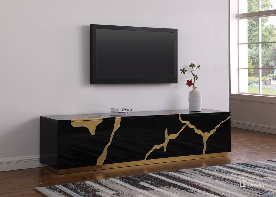 The appearance of Sanford High Gloss Wood With Gold Accent Modern TV Stand In Black designed by Best Master Furniture in the modern / contemporary interior design. This black piece of furniture  was selected by 1StopBedrooms from Sanford Collection to add a touch of cosiness and style into your home. Sku: T1945BTV. Material: Wood. Product Type: TV Stand. Image1
