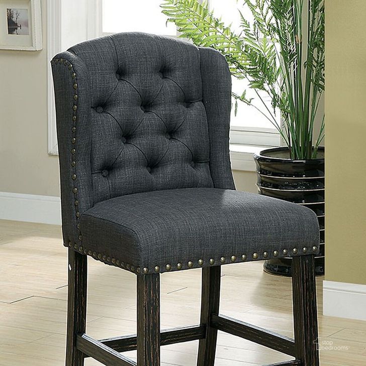 The appearance of Sania Counter Height Wingback Chair Set of 2 In Dark Gray designed by Furniture of America in the rustic / southwestern interior design. This dark gray piece of furniture  was selected by 1StopBedrooms from Sania Collection to add a touch of cosiness and style into your home. Sku: CM3324BK-GY-PCW-2PK. Material: Wood. Product Type: Counter Height Chair.