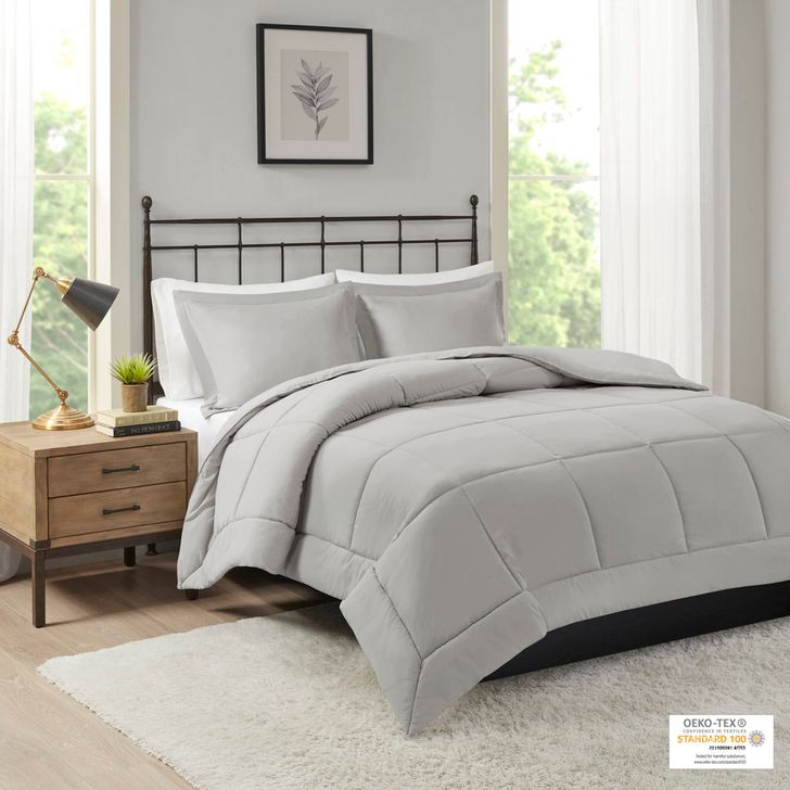 The appearance of Sarasota Polyester Microcell Down Alternative King Comforter Mini Set With 3M Moisture Treatement In Grey designed by Olliix in the transitional interior design. This grey piece of furniture  was selected by 1StopBedrooms from Sarasota Collection to add a touch of cosiness and style into your home. Sku: MP10-2435. Bed Size: King. Product Type: Comforter Set. Image1