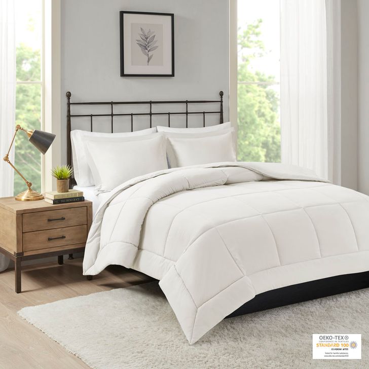 The appearance of Sarasota Polyester Microcell Down Alternative Queen Comforter Mini Set With 3M Moisture Treatment In Ivory designed by Olliix in the transitional interior design. This ivory piece of furniture  was selected by 1StopBedrooms from Sarasota Collection to add a touch of cosiness and style into your home. Sku: MP10-1253. Bed Size: Queen. Product Type: Comforter Set. Image1