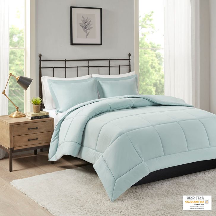 The appearance of Sarasota Polyester Microcell Down Alternative Queen Comforter Mini Set With 3M Moisture Treatment In Seafoam designed by Olliix in the transitional interior design. This seafoam piece of furniture  was selected by 1StopBedrooms from Sarasota Collection to add a touch of cosiness and style into your home. Sku: MP10-1256. Bed Size: Queen. Product Type: Comforter Set. Image1