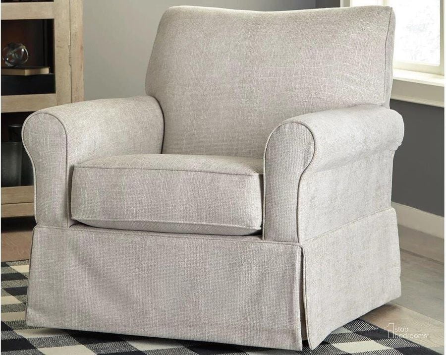 The appearance of Searcy Quartz Swivel Glider Accent Chair designed by Signature Design by Ashley in the transitional interior design. This quartz piece of furniture  was selected by 1StopBedrooms from Searcy Collection to add a touch of cosiness and style into your home. Sku: A3000006. Material: Fabric. Product Type: Living Room Chair. Image1