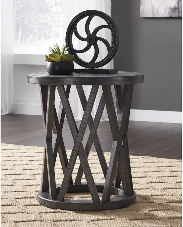 The appearance of Sharzane Grayish Brown Round End Table designed by Signature Design by Ashley in the transitional interior design. This grayish brown piece of furniture  was selected by 1StopBedrooms from Sharzane Collection to add a touch of cosiness and style into your home. Sku: T711-6. Material: Wood. Product Type: End Table. Image1