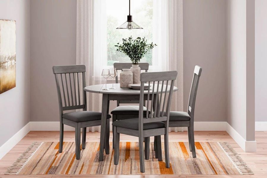 The appearance of Shullden Dining Room Set In Gray designed by Signature Design by Ashley in the transitional interior design. This gray piece of furniture  was selected by 1StopBedrooms from Shullden Collection to add a touch of cosiness and style into your home. Sku: D194-15;D194-01;D194-01;D194-01;D194-01. Material: Wood. Product Type: Dining Room Set. Image1