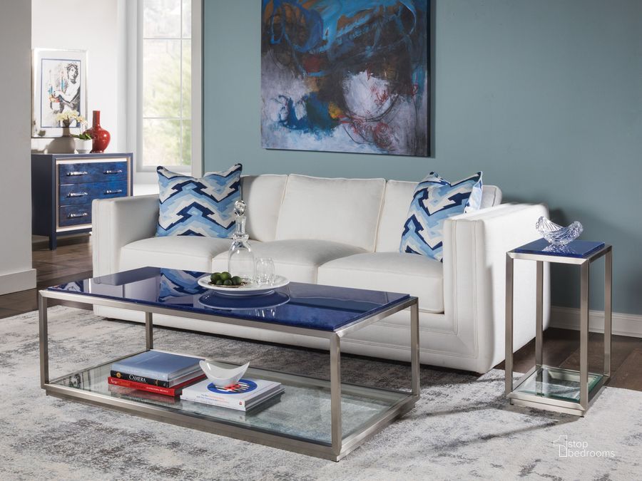 The appearance of Signature Designs Blue and Brushed Stainless Steel Ultramarine Rectangular Occasional Table Set designed by Artistica Home in the modern / contemporary interior design. This blue piece of furniture  was selected by 1StopBedrooms from Signature Designs Collection to add a touch of cosiness and style into your home. Sku: 01-2288-945C;01-2288-950. Product Type: Occasional Table Set. Image1