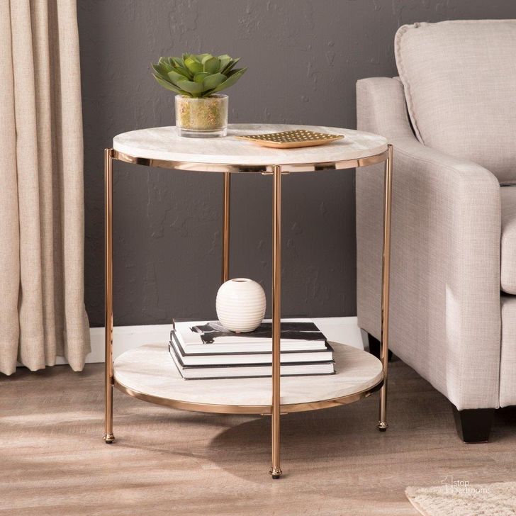 The appearance of Silas Round Faux Stone End Table In Champagne designed by SEI Furniture in the transitional interior design. This champagne piece of furniture  was selected by 1StopBedrooms from Silas Collection to add a touch of cosiness and style into your home. Sku: CK5732. Material: Wood. Product Type: End Table. Image1