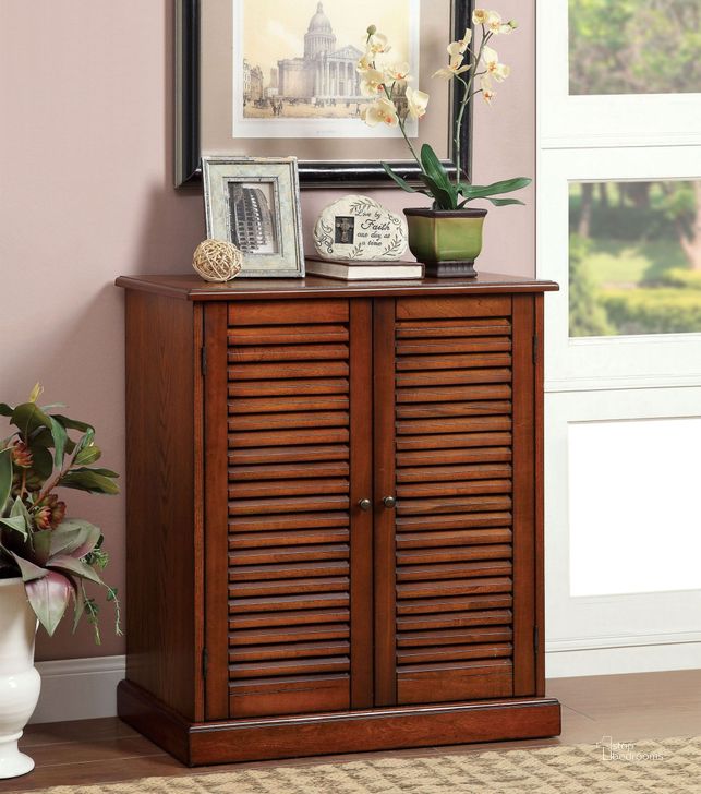 The appearance of Silverwood Brown Shoe Cabinet Entryway Furniture 0qe2200791 designed by Isaac Tahari in the transitional interior design. This brown piece of furniture  was selected by 1StopBedrooms from Silverwood Collection to add a touch of cosiness and style into your home. Sku: CM-AC213A. Material: Wood. Product Type: Shoe Cabinet. Image1