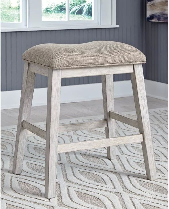 The appearance of Skempton White And Light Brown Counter Height Bar Stool Set of 2 designed by Signature Design by Ashley in the transitional interior design. This white/light brown piece of furniture  was selected by 1StopBedrooms from Skempton Collection to add a touch of cosiness and style into your home. Sku: D394-024. Material: Fabric. Product Type: Barstool. Image1