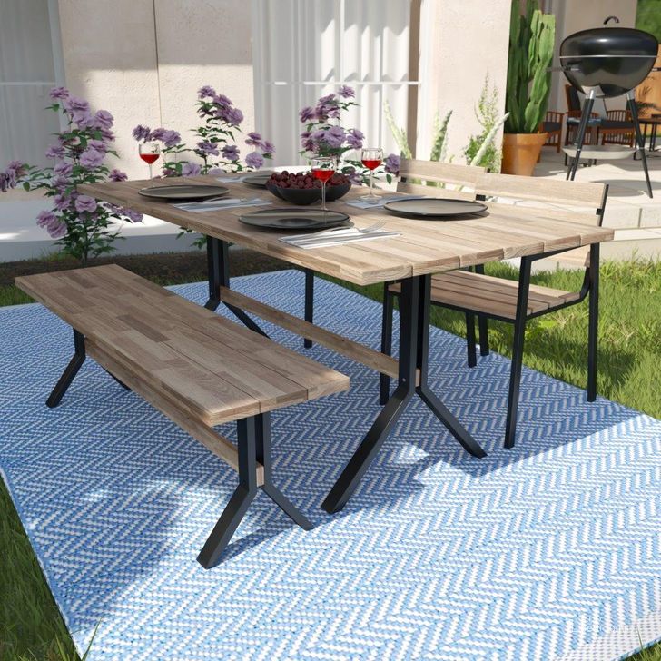 The appearance of Standlake Slatted Outdoor Dining Table designed by SEI Furniture in the modern / contemporary interior design. This natural piece of furniture  was selected by 1StopBedrooms from Standlake Collection to add a touch of cosiness and style into your home. Sku: OD1132327. Material: Steel. Product Type: Outdoor Dining Table. Size: 71". Image1