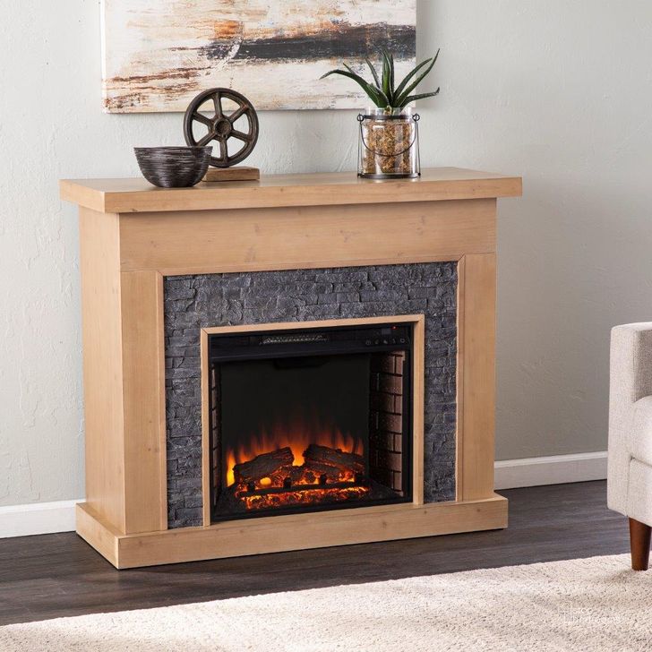 The appearance of Standlon Electric Fireplace With Faux Stone Surround designed by SEI Furniture in the country / farmhouse interior design. This natural piece of furniture  was selected by 1StopBedrooms from Standlon Collection to add a touch of cosiness and style into your home. Sku: FE1161859. Material: Wood. Product Type: Fireplace. Image1