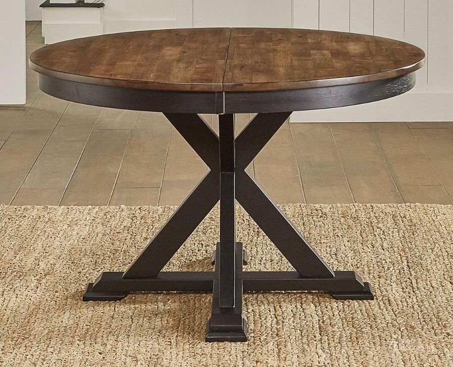 The appearance of Stone Creek Chickory And Black Extendable Oval Dining Table designed by A-America in the transitional interior design. This black and brown piece of furniture  was selected by 1StopBedrooms from Stone Creek Collection to add a touch of cosiness and style into your home. Sku: STOBL625B;STOBL625T. Table Base Style: Trestle. Table Top Shape: Oval. Product Type: Dining Table. Material: Rubberwood. Size: 48.
