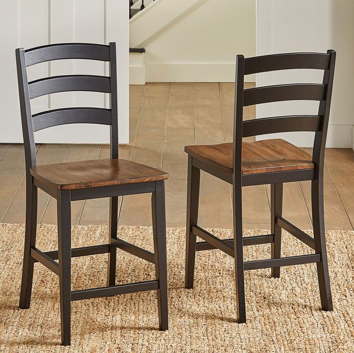 The appearance of Stone Creek Chickory And Black Ladderback Counter Height Chair Set Of 2 designed by A-America in the transitional interior design. This black and brown piece of furniture  was selected by 1StopBedrooms from Stone Creek Collection to add a touch of cosiness and style into your home. Sku: STOBL3552. Product Type: Counter Height Chair. Material: Rubberwood. Image1