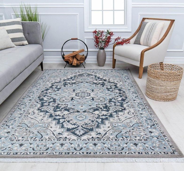 The appearance of Stratford AM50B Evergreen Forest Abstract Vintage Blue 2' x 8' Area Rug designed by Rugs America in the rustic / southwestern interior design. This blue piece of furniture  was selected by 1StopBedrooms from Stratford Collection to add a touch of cosiness and style into your home. Sku: RA30755. Material: Polypropylene. Product Type: Area Rugs. Image1