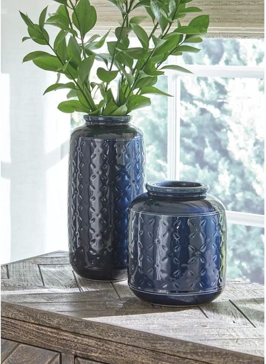 The appearance of Sulpice Navy Blue Decorative Accessory Set of 2 designed by Boho House in the modern / contemporary interior design. This navy blue piece of furniture  was selected by 1StopBedrooms from Sulpice Collection to add a touch of cosiness and style into your home. Sku: A2000130. Material: Ceramic. Product Type: Vase. Image1