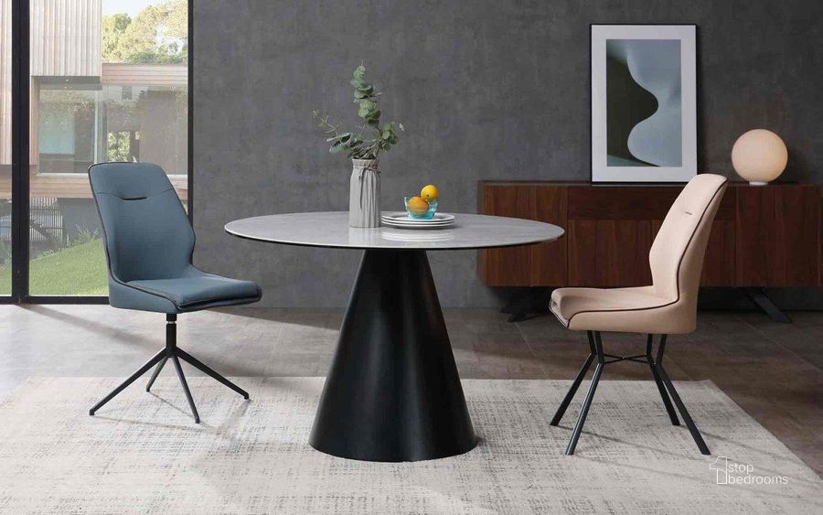The appearance of Sun Round Dining Table In Black Lacquer Base designed by Whiteline Modern Living in the modern / contemporary interior design. This black piece of furniture  was selected by 1StopBedrooms from Sun Collection to add a touch of cosiness and style into your home. Sku: DT1638R-BLK/GRY. Table Base Style: Pedestal. Table Top Shape: Round. Product Type: Dining Table. Material: Ceramic. Size: 47". Image1