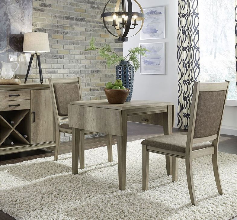The appearance of Sun Valley Drop Leaf Dining Room Set w/ Upholstered Chairs designed by Liberty in the transitional interior design. This sandstone piece of furniture  was selected by 1StopBedrooms from Sun Valley Collection to add a touch of cosiness and style into your home. Sku: 439-T2947;439-C6501S. Table Base Style: Legs. Material: Wood. Product Type: Dining Room Set. Table Top Shape: Rectangular. Image1