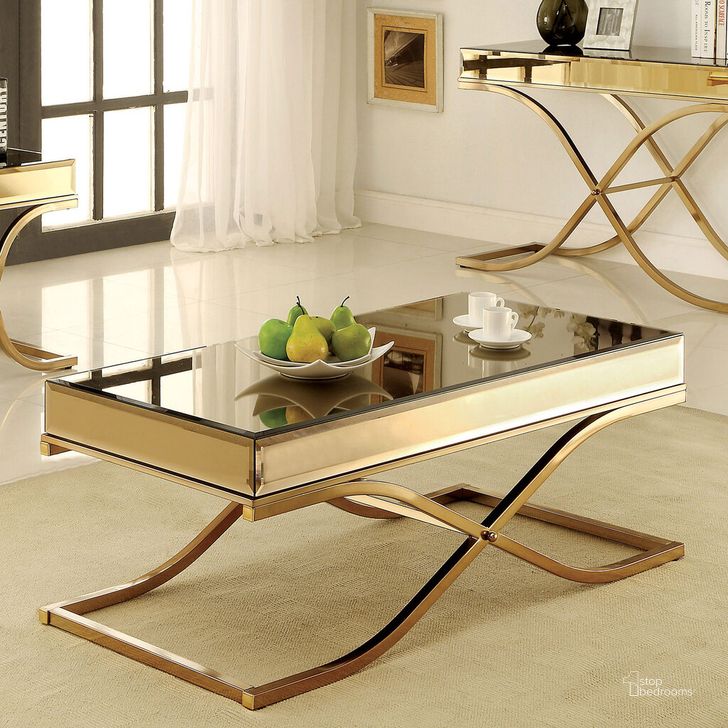 The appearance of Sundance Coffee Table In Brass designed by Furniture of America in the modern / contemporary interior design. This brass piece of furniture  was selected by 1StopBedrooms from Sundance Collection to add a touch of cosiness and style into your home. Sku: CM4230C. Material: Metal. Product Type: Coffee Table. Table Top Shape: Rectangular. Image1