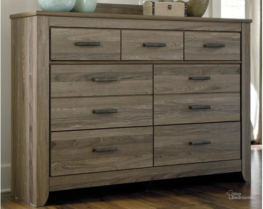 The appearance of Surman Warm Gray Dresser designed by Bennett Interiors in the transitional interior design. This warm gray piece of furniture  was selected by 1StopBedrooms from Surman Collection to add a touch of cosiness and style into your home. Sku: B248-31. Material: Wood. Product Type: Dresser. Image1