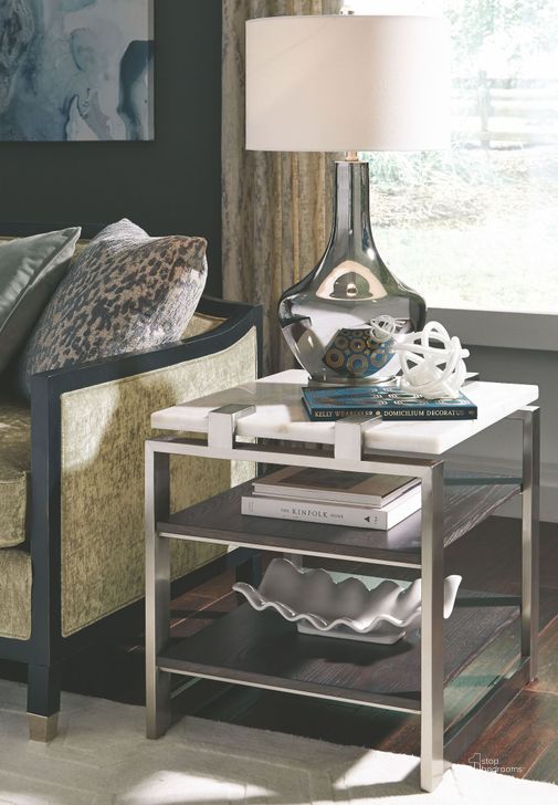 The appearance of Paradox Pearl White Roasted Almond Metal Rectangular End Table designed by Magnussen in the modern / contemporary interior design. This white piece of furniture  was selected by 1StopBedrooms from Paradox Collection to add a touch of cosiness and style into your home. Sku: T4852-03. Product Type: End Table. Material: Stone. Image1