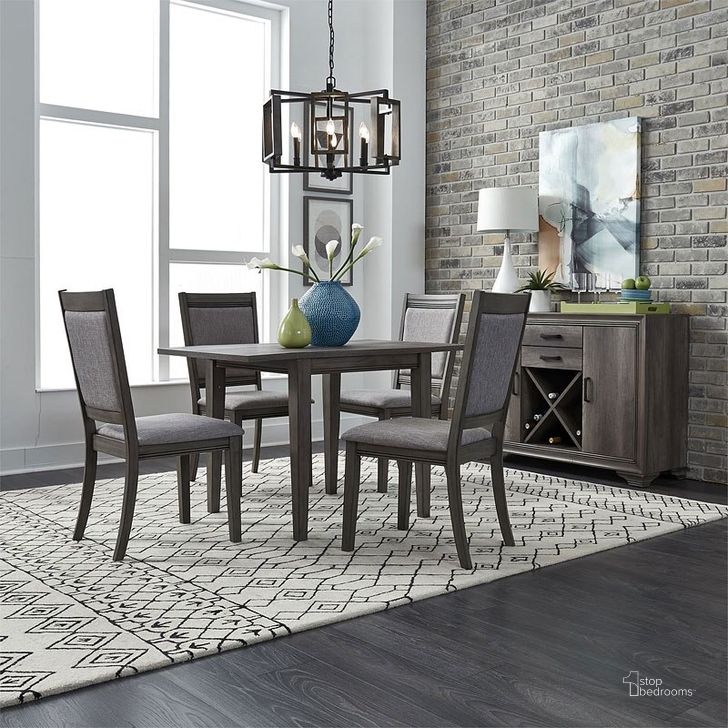 The appearance of Tanners Creek Drop Leaf Dining Room Set w/ Upholstered Chairs designed by Liberty in the transitional interior design. This greystone piece of furniture  was selected by 1StopBedrooms from Tanners Creek Collection to add a touch of cosiness and style into your home. Sku: 686-T2947;686-C6501S. Table Base Style: Legs. Material: Wood. Product Type: Dining Room Set. Table Top Shape: Rectangular. Image1