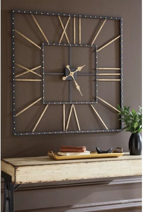 The appearance of Thames Black Wall Clock designed by Signature Design by Ashley in the modern / contemporary interior design. This black/gold piece of furniture  was selected by 1StopBedrooms from Thames Collection to add a touch of cosiness and style into your home. Sku: A8010112. Material: Metal. Product Type: Wall Clock. Image1