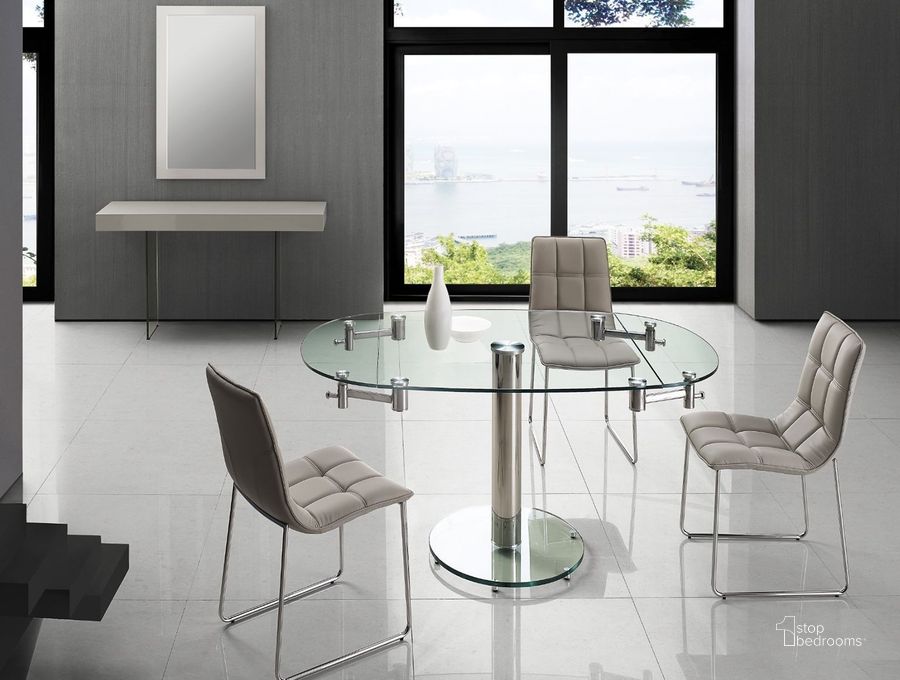 The appearance of Thao Extendable Dining Room Set with Leandro Dining Chairs designed by Casabianca Home in the modern / contemporary interior design. This chrome piece of furniture  was selected by 1StopBedrooms from Thao Collection to add a touch of cosiness and style into your home. Sku: CB-T030;CB-870. Table Base Style: Pedestal. Table Top Shape: Oval. Product Type: Dining Room Set. Material: Stainless Steel. Image1