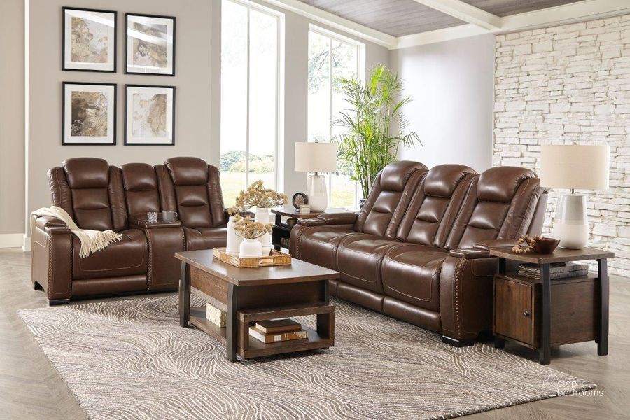 The appearance of The Man Den Power Reclining Living Room Set With Adjustable Headrest In Mahogany designed by Signature Design by Ashley in the modern / contemporary interior design. This mahogany piece of furniture  was selected by 1StopBedrooms from The Man-Den Collection to add a touch of cosiness and style into your home. Sku: U8530615;U8530618. Product Type: Living Room Set. Material: Leather Match. Image1