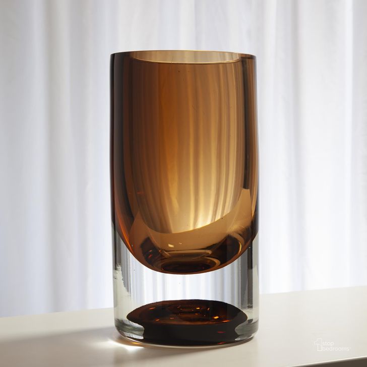The appearance of Thick Cylinder Large Vase In Amber Tobacco designed by Global Views in the modern / contemporary interior design. This brown piece of furniture  was selected by 1StopBedrooms from Thick Collection to add a touch of cosiness and style into your home. Sku: 6.60431. Material: Glass. Product Type: Vase. Image1